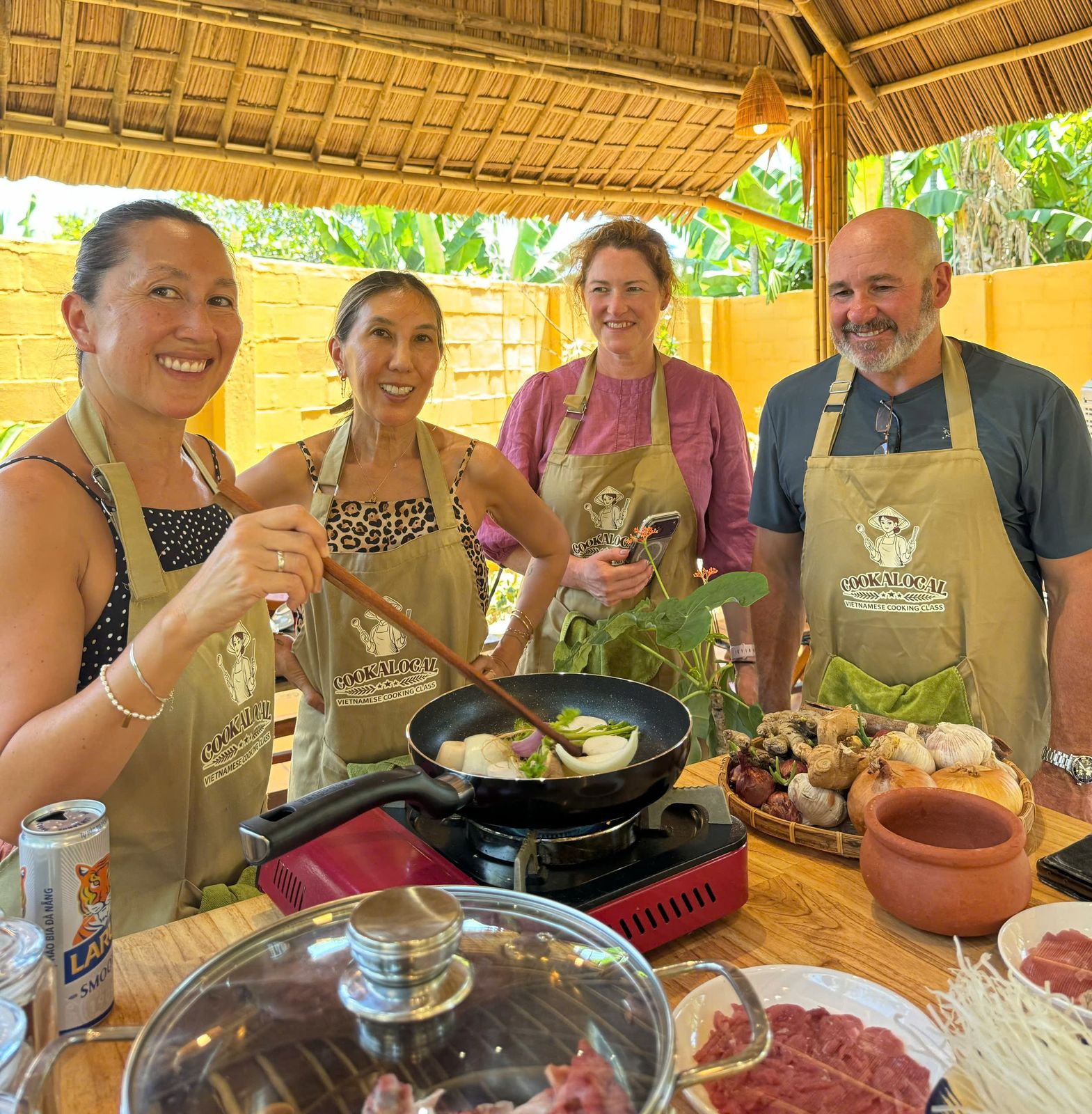 Guests gathered around the table after a class